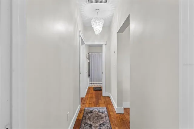 a very nice looking room with a large mirror and a shower