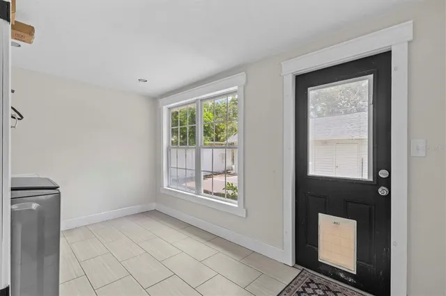 a view of an empty room and window