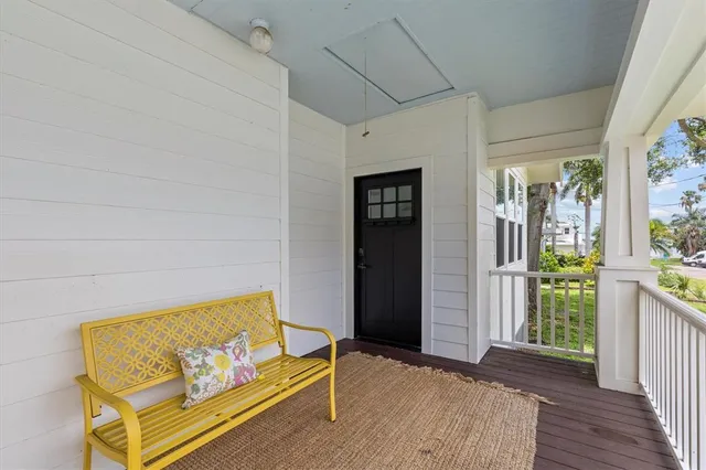 a view of a livingroom with furniture and front door