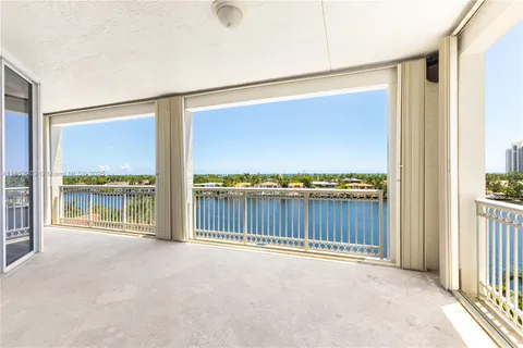 a view of a balcony with city view