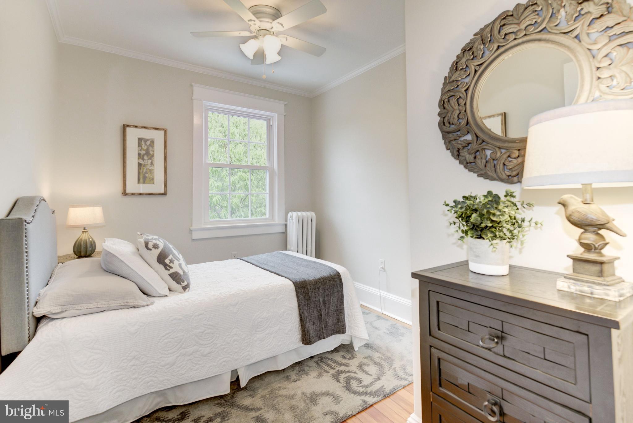 3601 T Street Northwest Washington, DC 20007 - Photo 10 of 20 a bedroom with a bed and a potted plant