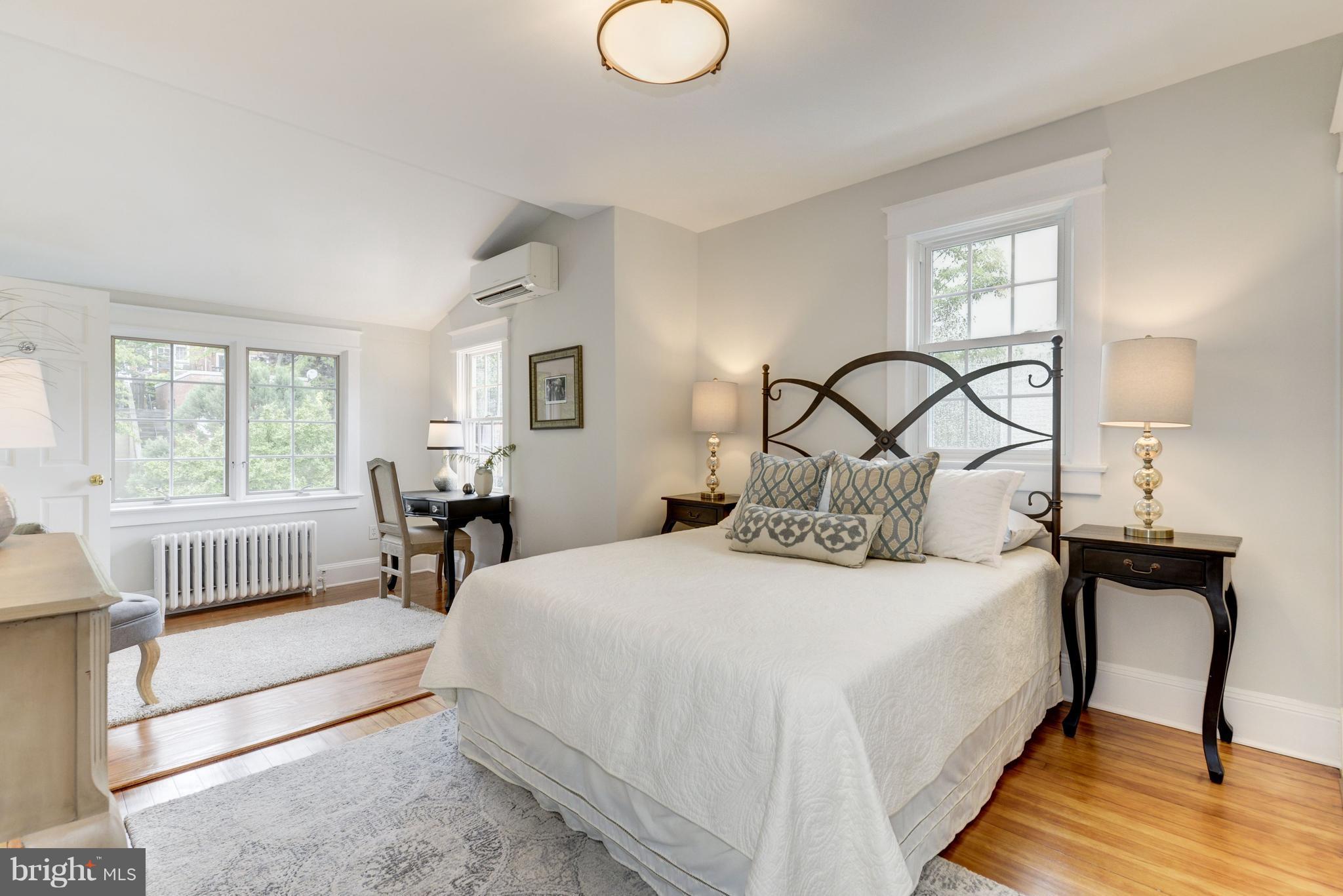 3601 T Street Northwest Washington, DC 20007 - Photo 11 of 20 a bedroom with a bed and a window