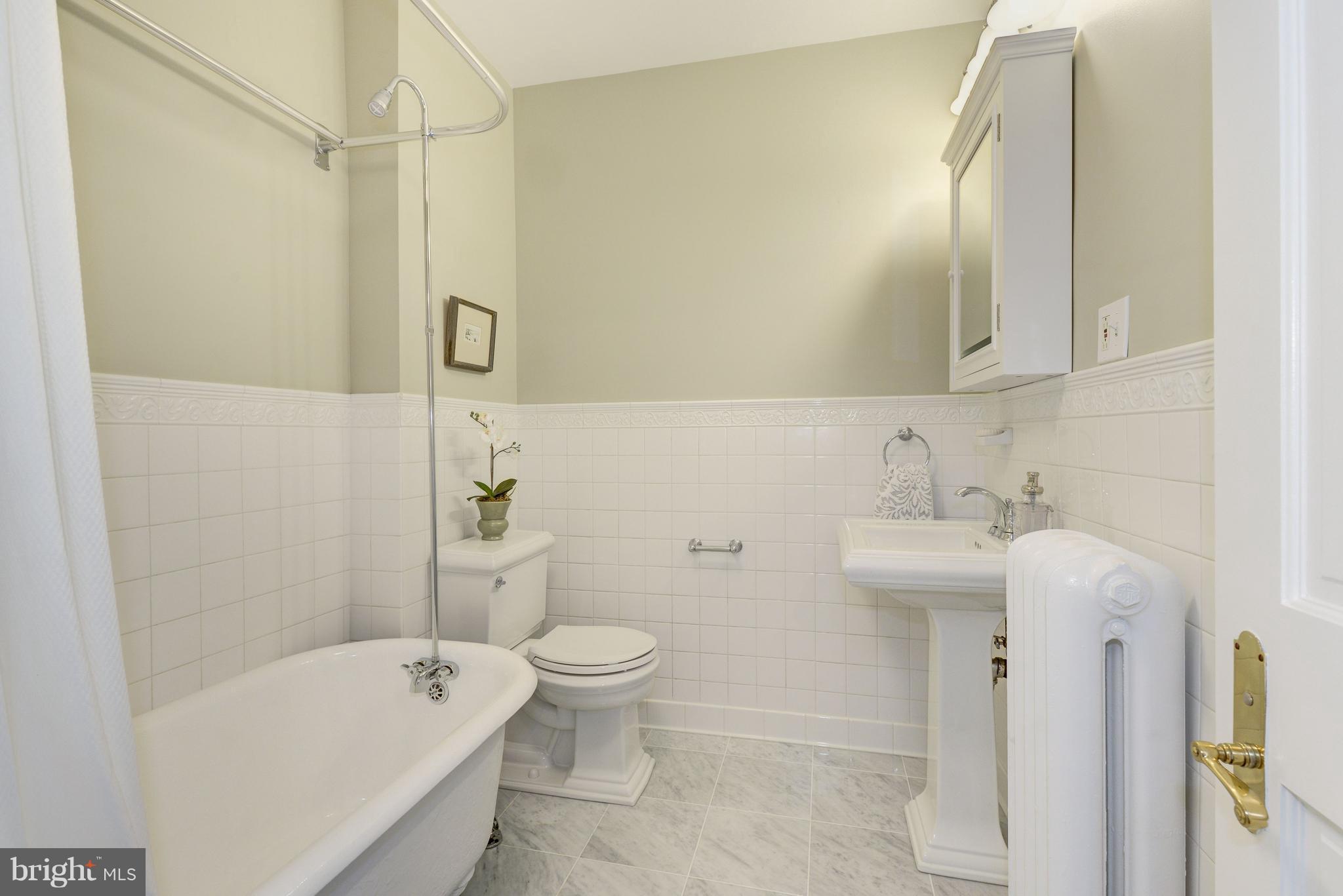 3601 T Street Northwest Washington, DC 20007 - Photo 13 of 20 a bathroom with a sink toilet and shower