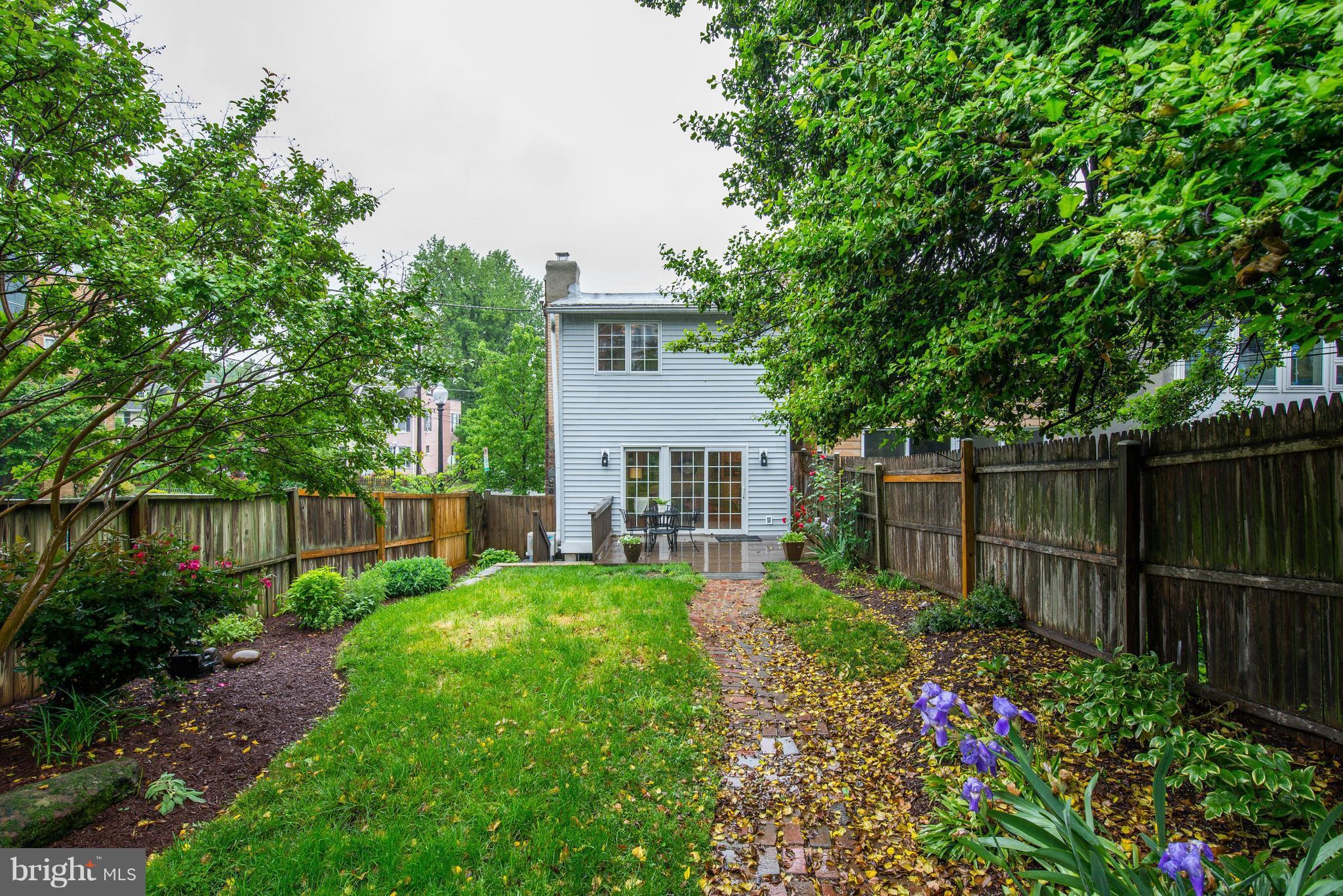 3601 T Street Northwest Washington, DC 20007 - Photo 17 of 20 a view of a garden with wooden fence