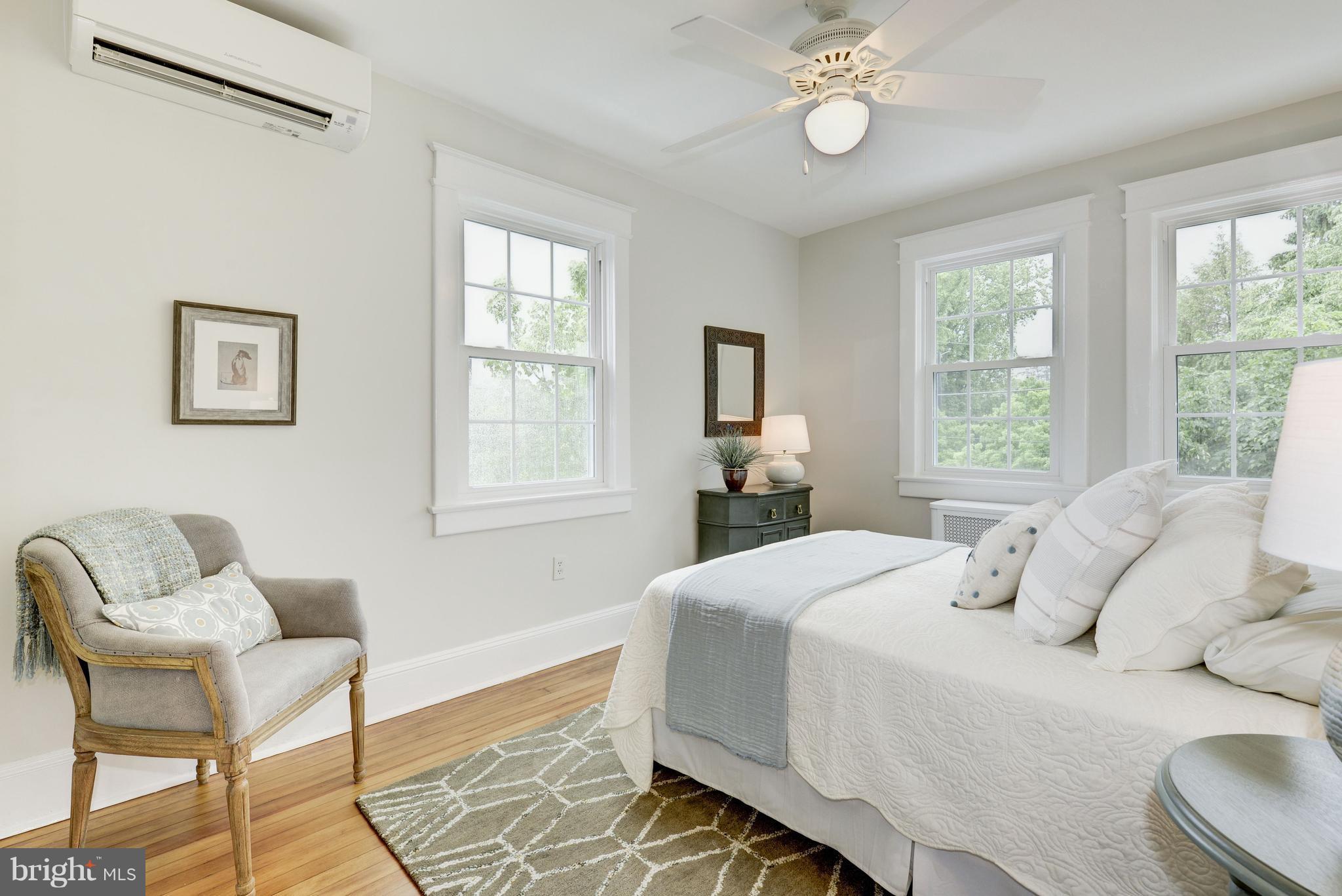 3601 T Street Northwest Washington, DC 20007 - Photo 9 of 20 a bedroom with a bed and chair