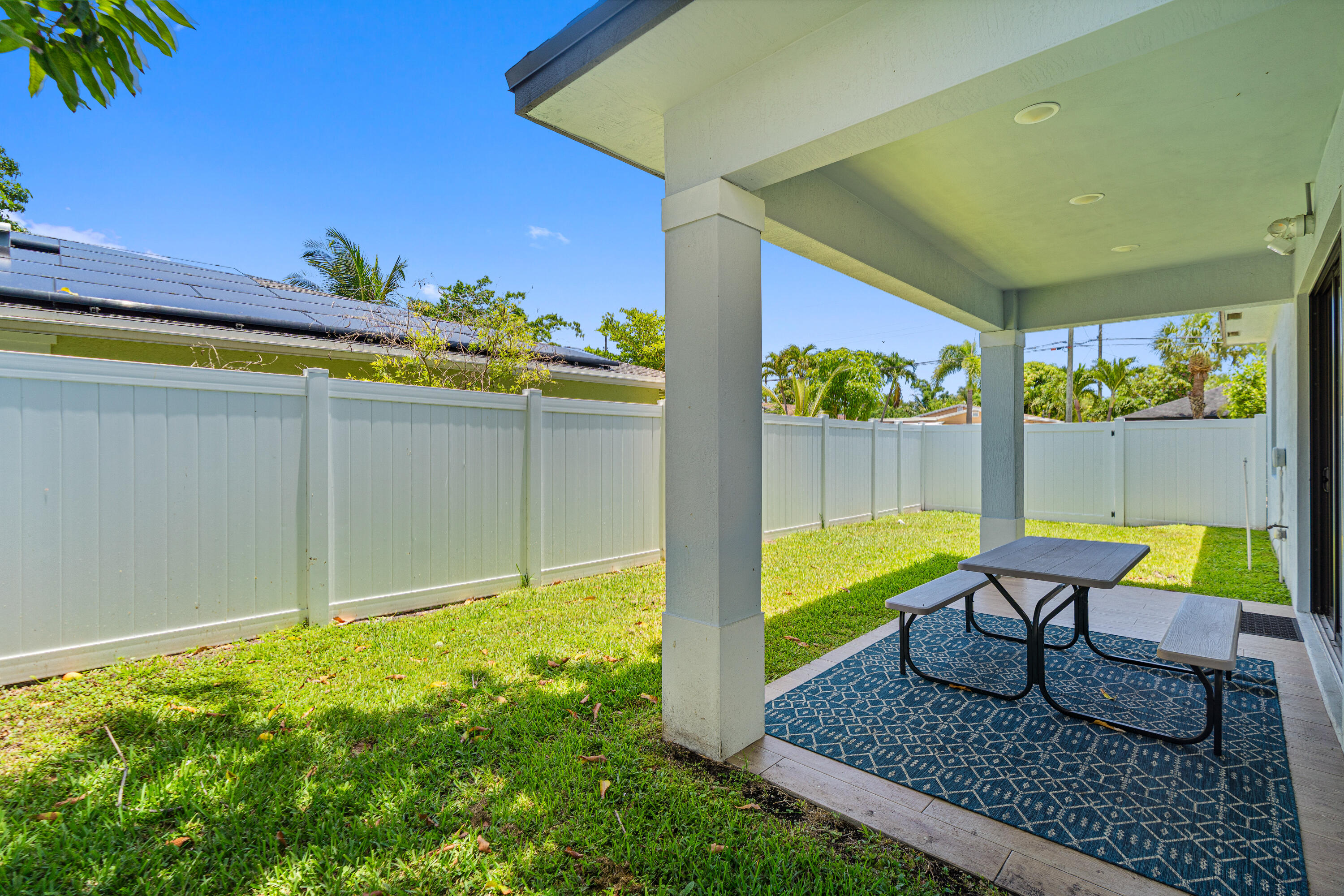 601 Southwest 3rd Street Delray Beach, FL 33444 - Photo 66 of 75 a view of a chairs and table in patio