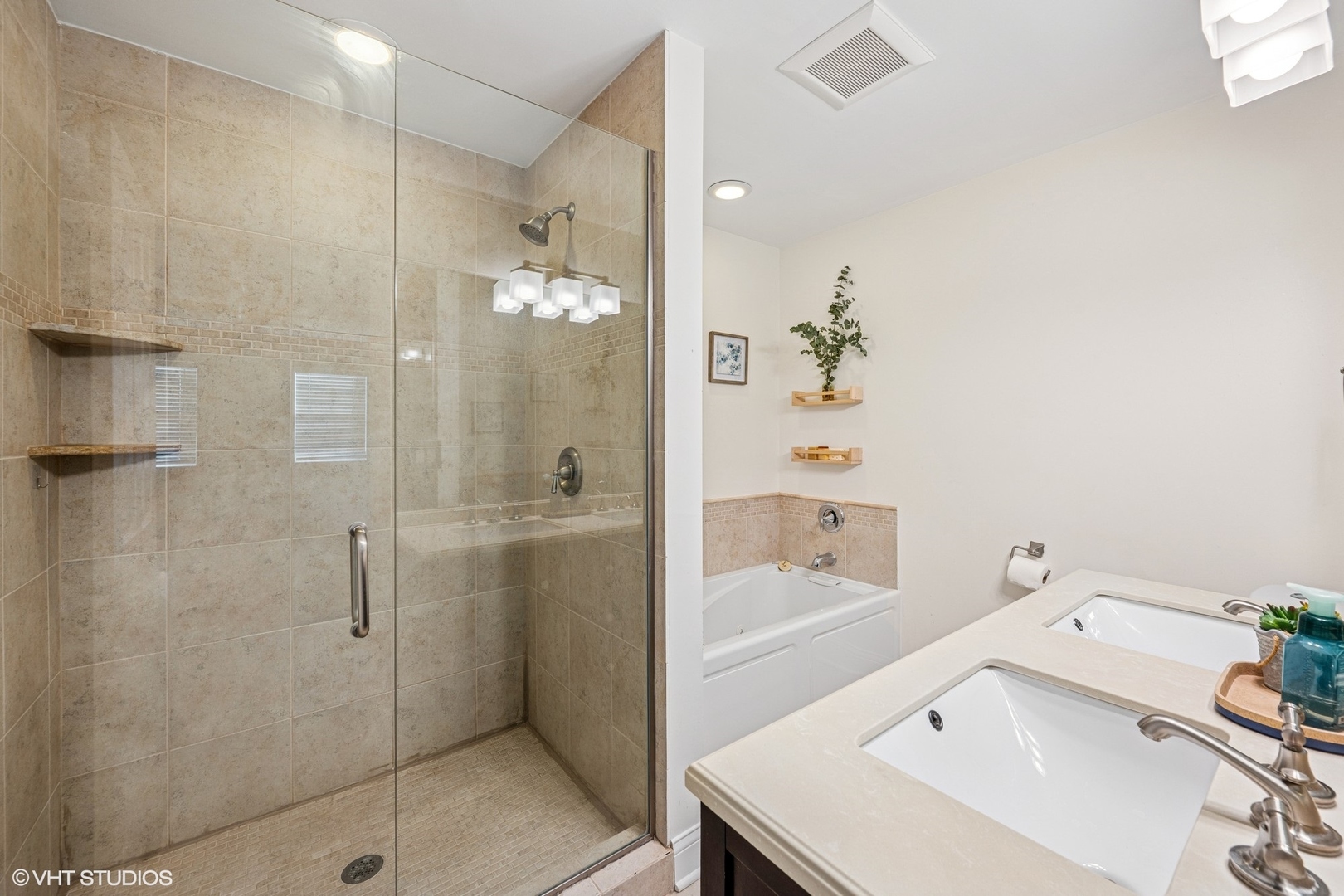 512 Braemar Lane Barrington, IL 60010 - Photo 12 of 24 a bathroom with a tub sink and mirror