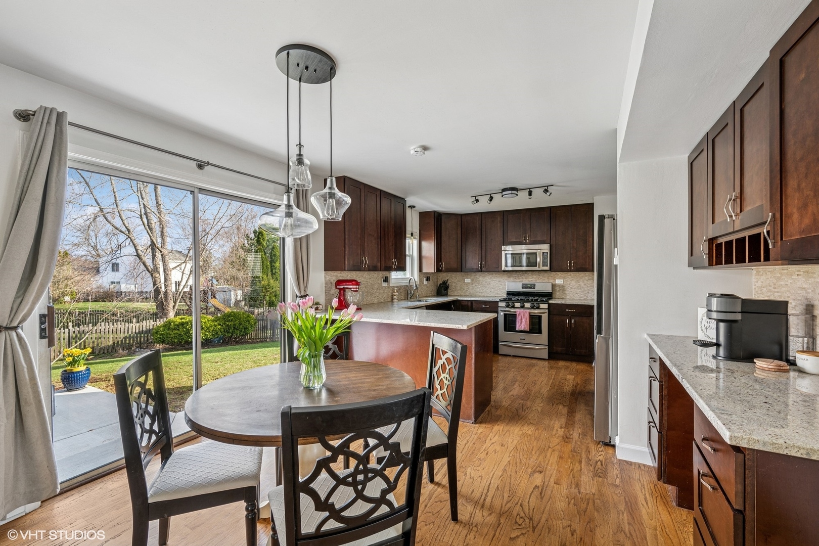 512 Braemar Lane Barrington, IL 60010 - Photo 7 of 24 a view of a dining room with furniture window and outside view