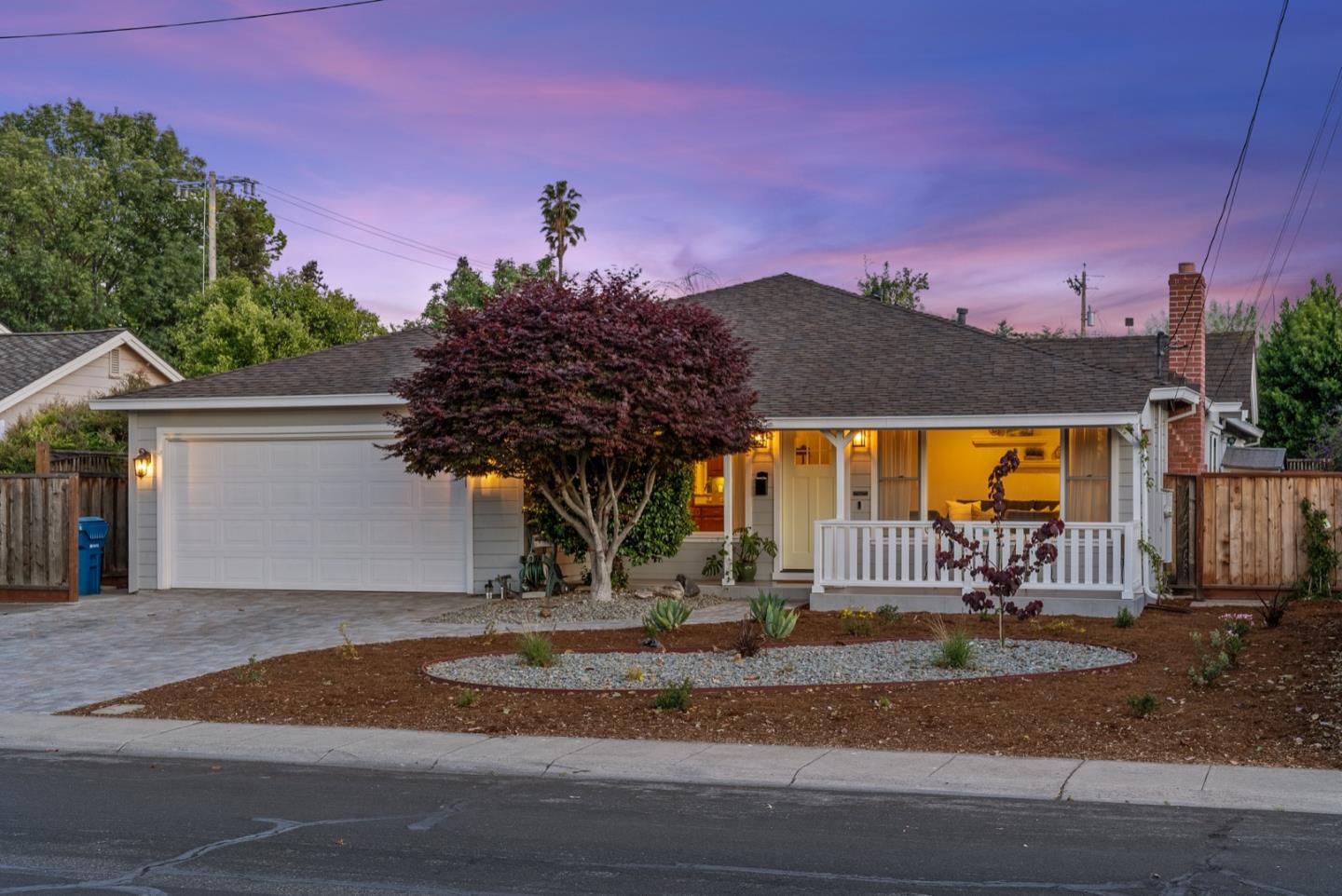 a view of a park with a tree