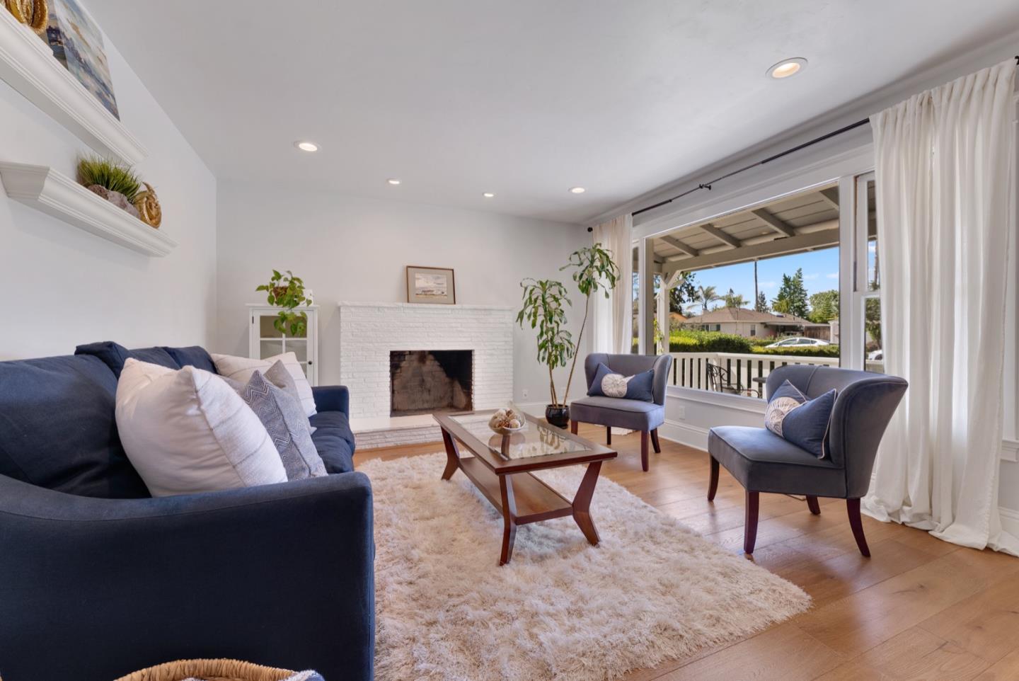 1240 Fewtrell Drive Campbell, CA 95008 - Photo 11 of 50 a living room with furniture and a fireplace