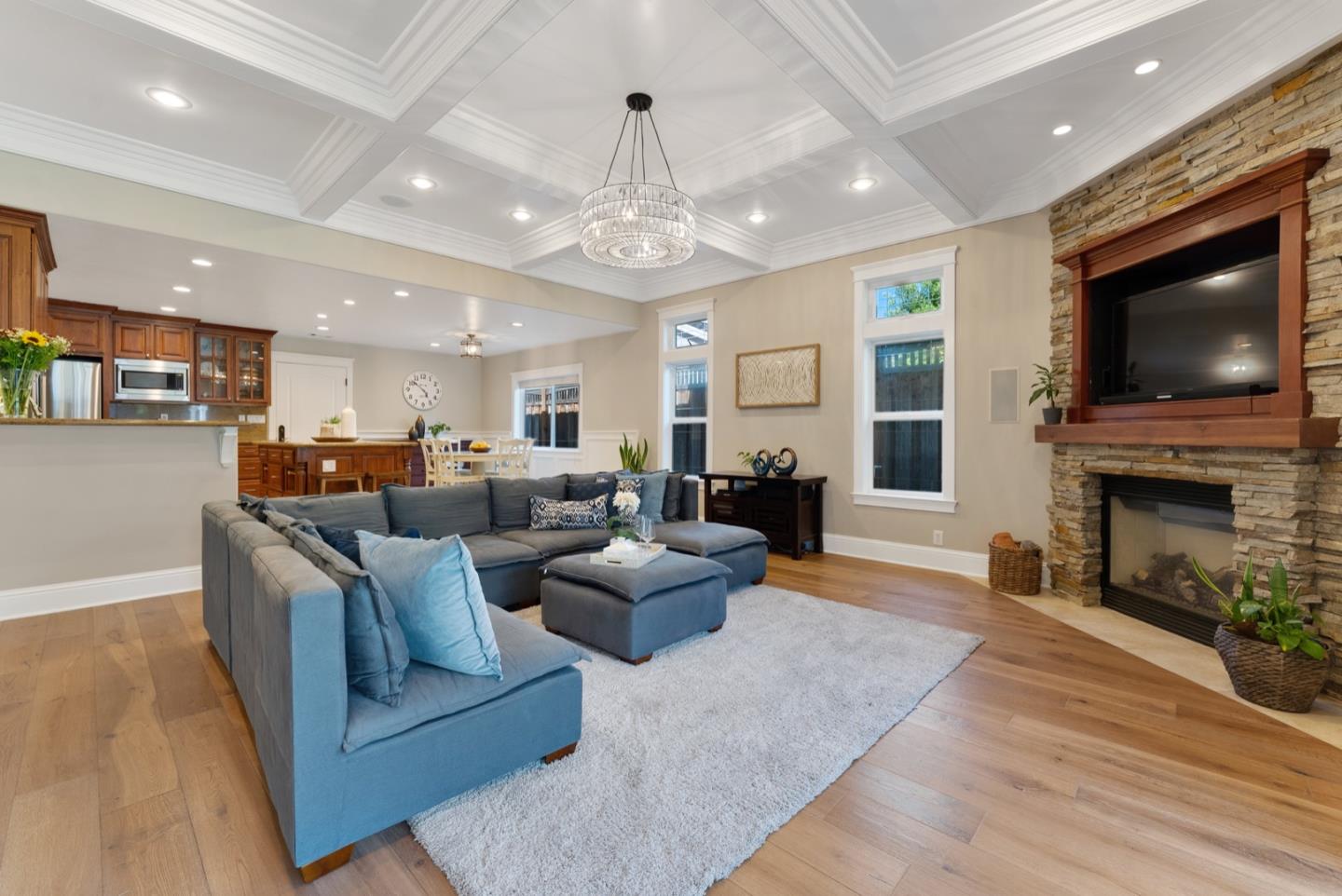 1240 Fewtrell Drive Campbell, CA 95008 - Photo 16 of 50 a living room with furniture a flat screen tv and a fireplace