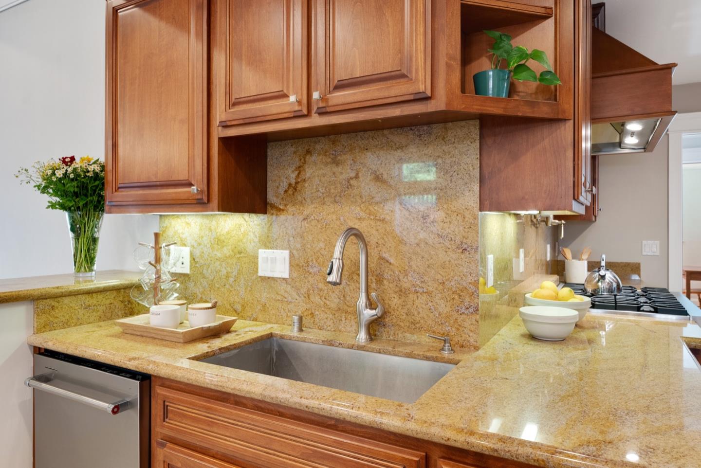 1240 Fewtrell Drive Campbell, CA 95008 - Photo 23 of 50 a kitchen with a sink and cabinets