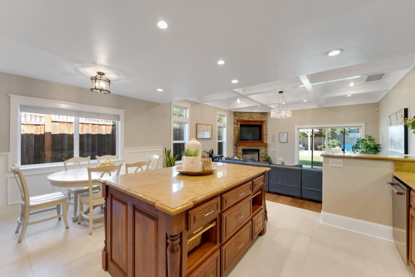 1240 Fewtrell Drive Campbell, CA 95008 - Photo 24 of 50 a kitchen with a stove a counter top space and living room view