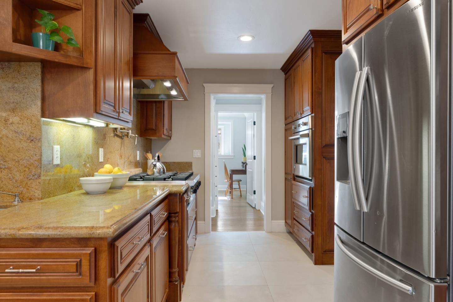 1240 Fewtrell Drive Campbell, CA 95008 - Photo 27 of 50 a kitchen with stainless steel appliances granite countertop a refrigerator a sink and a stove