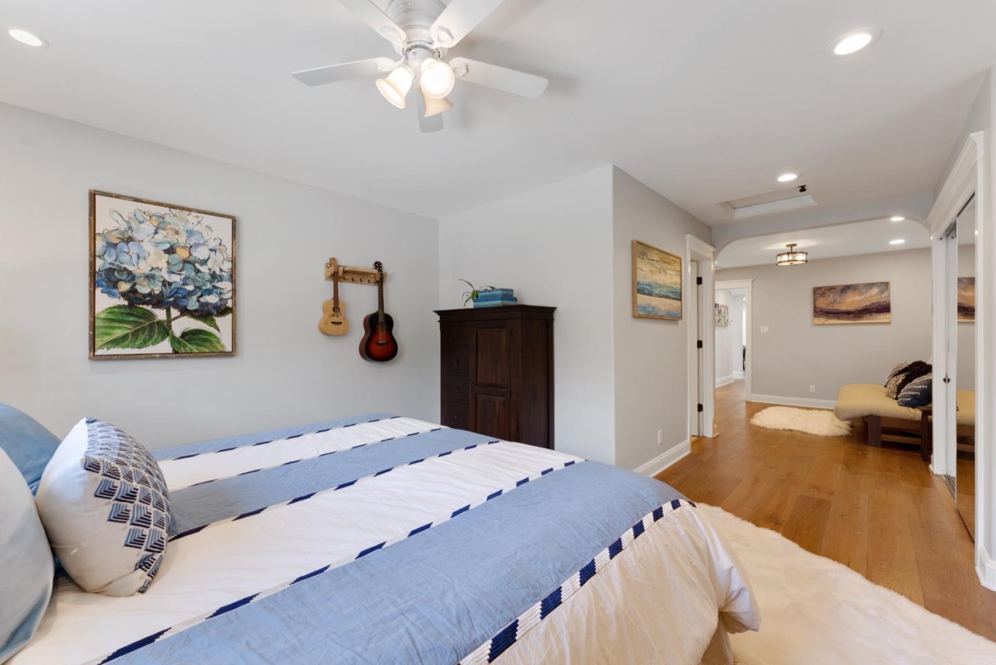 1240 Fewtrell Drive Campbell, CA 95008 - Photo 30 of 50 a bedroom with a bed and wooden floor