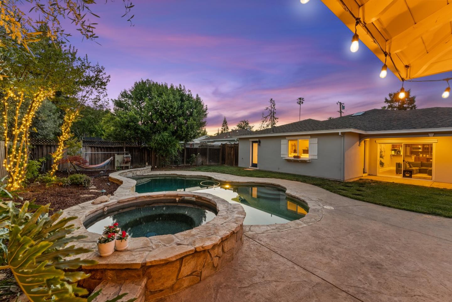 1240 Fewtrell Drive Campbell, CA 95008 - Photo 3 of 50 a front view of a house with swimming pool