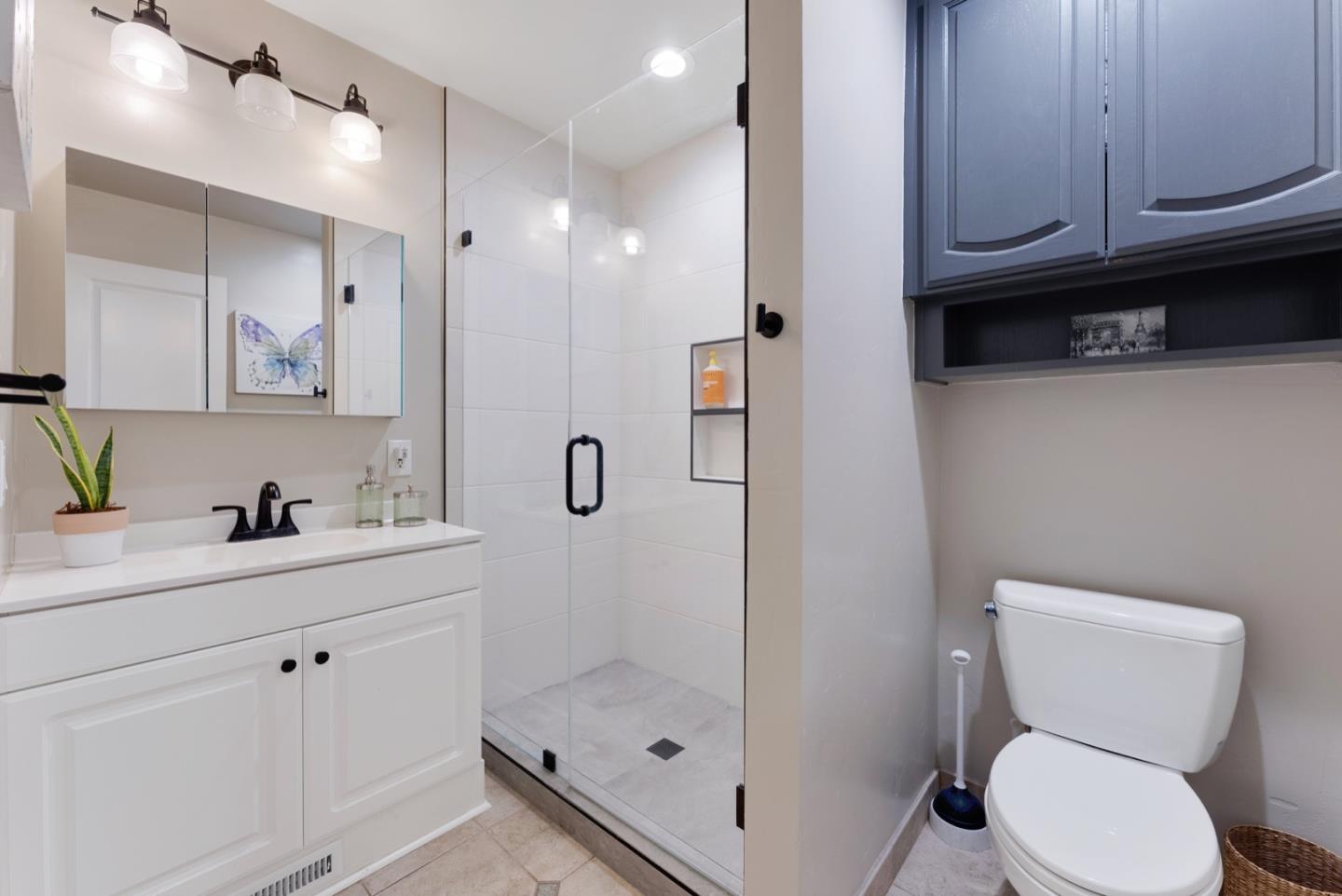 1240 Fewtrell Drive Campbell, CA 95008 - Photo 31 of 50 a bathroom with a sink a toilet and shower