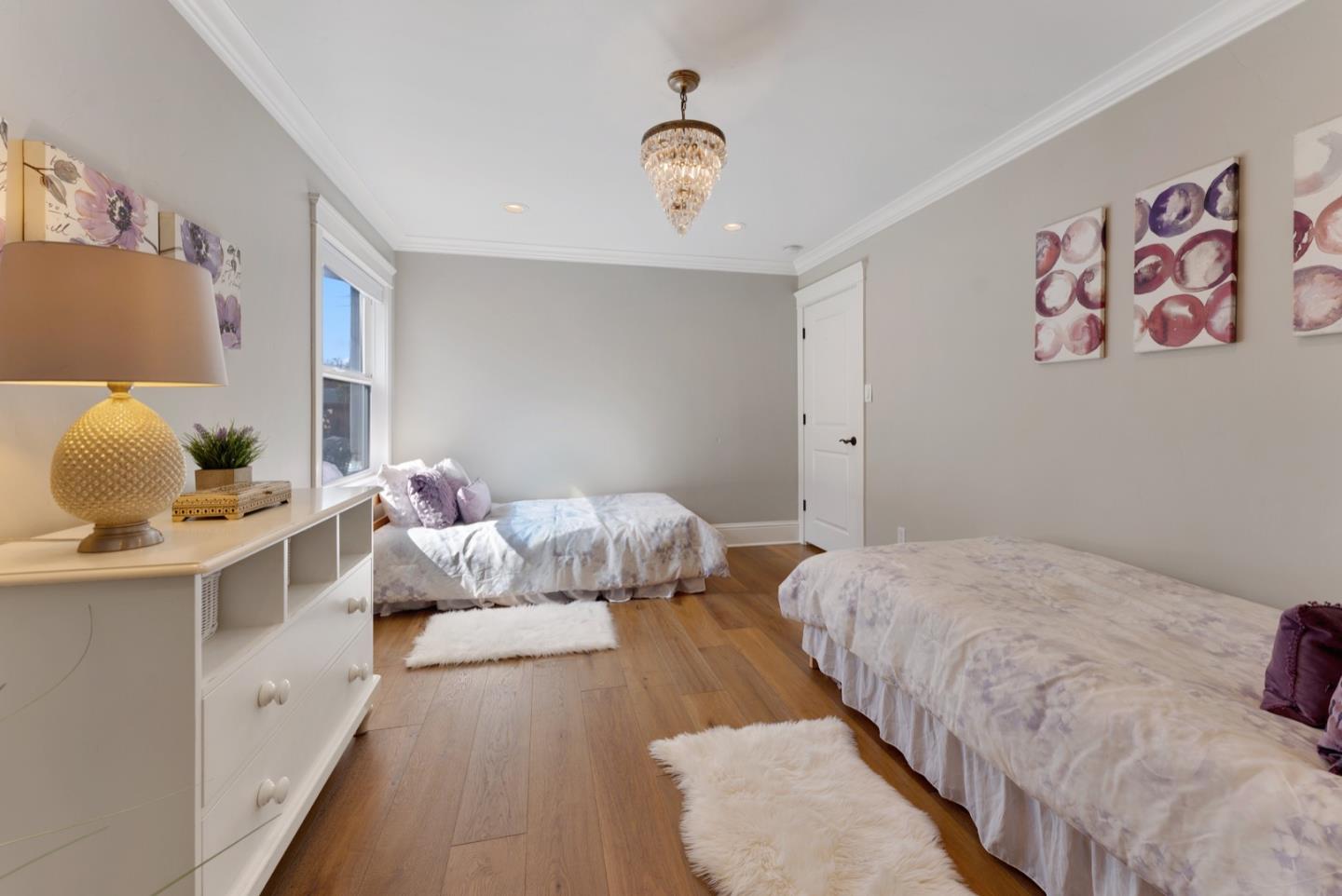 1240 Fewtrell Drive Campbell, CA 95008 - Photo 35 of 50 a bedroom with a bed and a painting on the wall