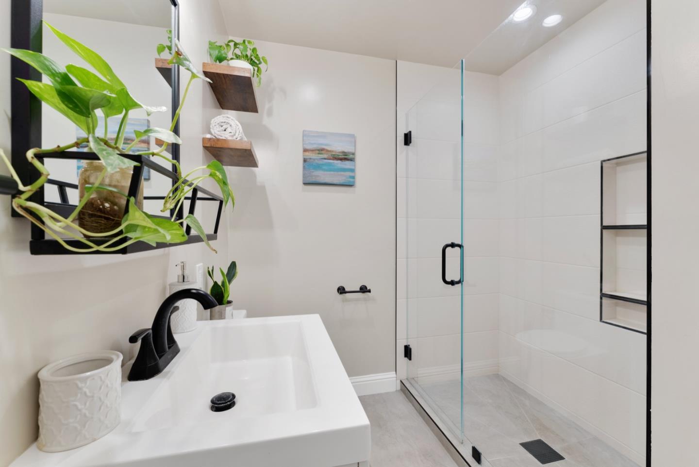 1240 Fewtrell Drive Campbell, CA 95008 - Photo 40 of 50 a bathroom with a sink a mirror and shower