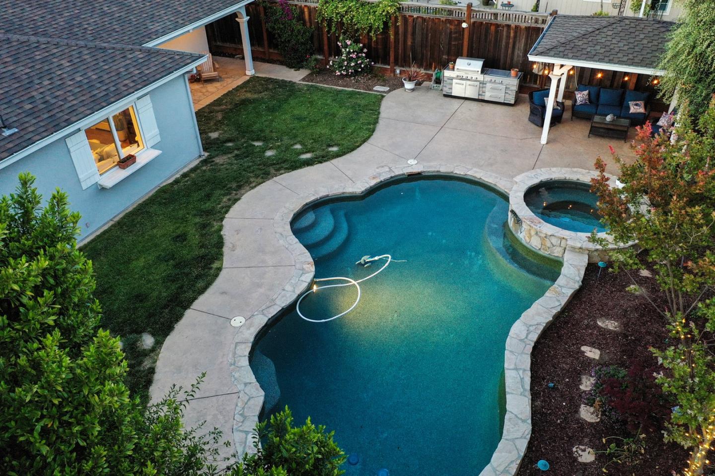 1240 Fewtrell Drive Campbell, CA 95008 - Photo 9 of 50 an aerial view of a house with garden space and swimming pool
