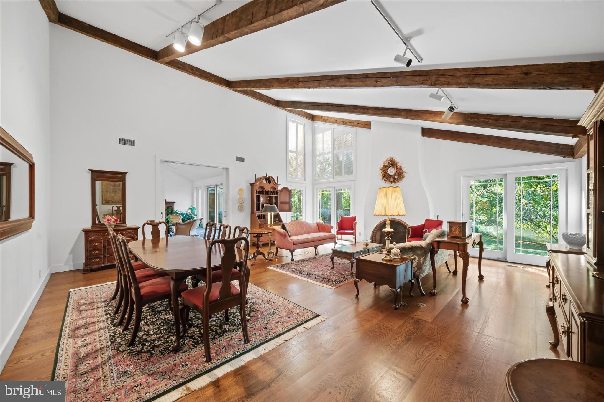 6 Carriage Road Greenville, DE 19807 - Photo 19 of 59 a living room with furniture and a large window
