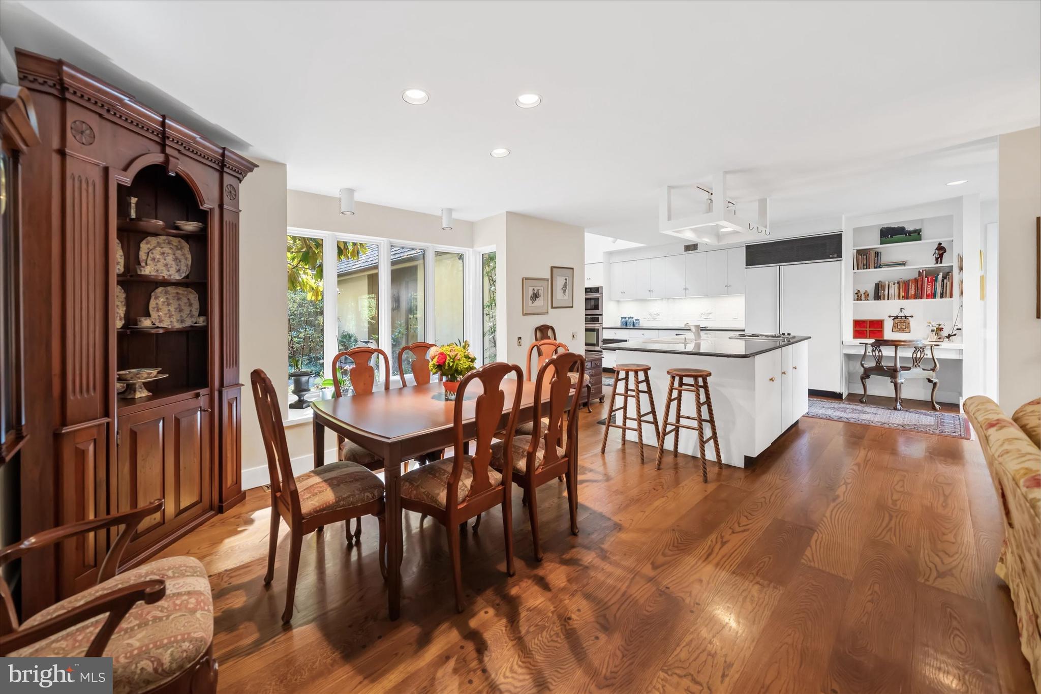 6 Carriage Road Greenville, DE 19807 - Photo 30 of 59 a view of a dining room with furniture and wooden floor
