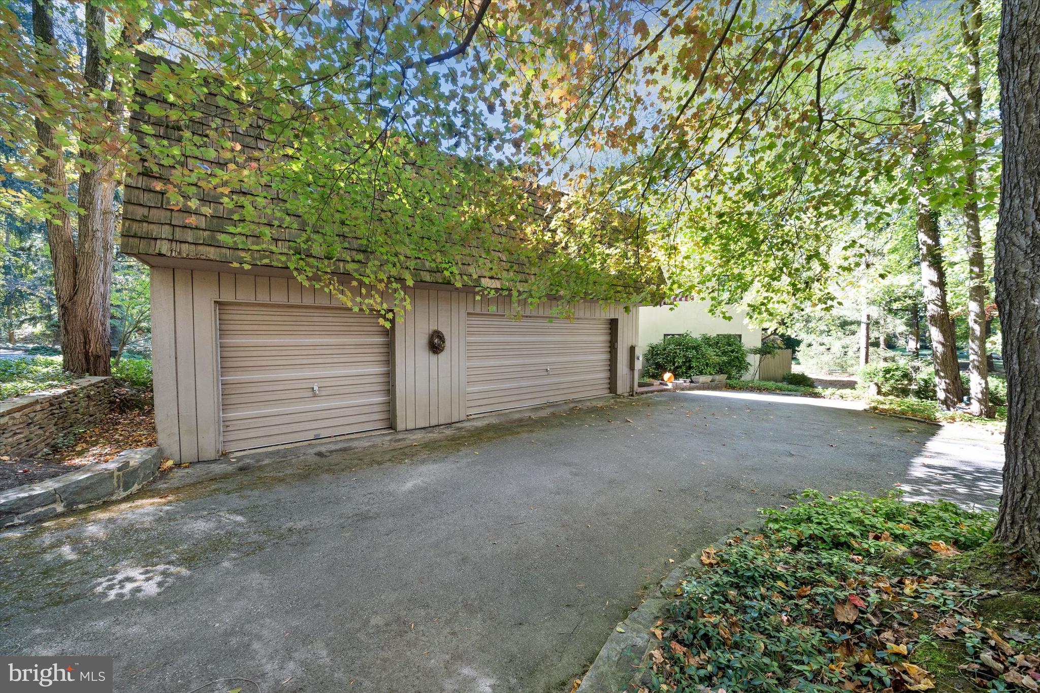 6 Carriage Road Greenville, DE 19807 - Photo 48 of 59 a view of a house with a tree