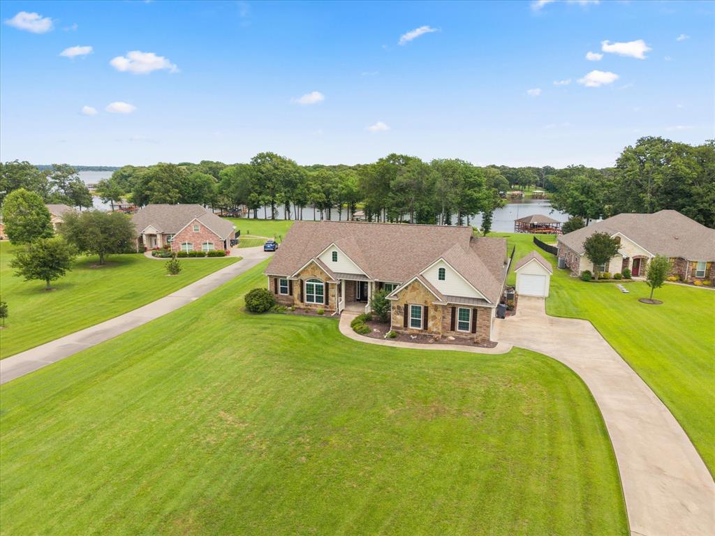 345 Rains County Road 3390 Emory, TX 75440 - Photo 5 of 39 a view of a house with a big yard