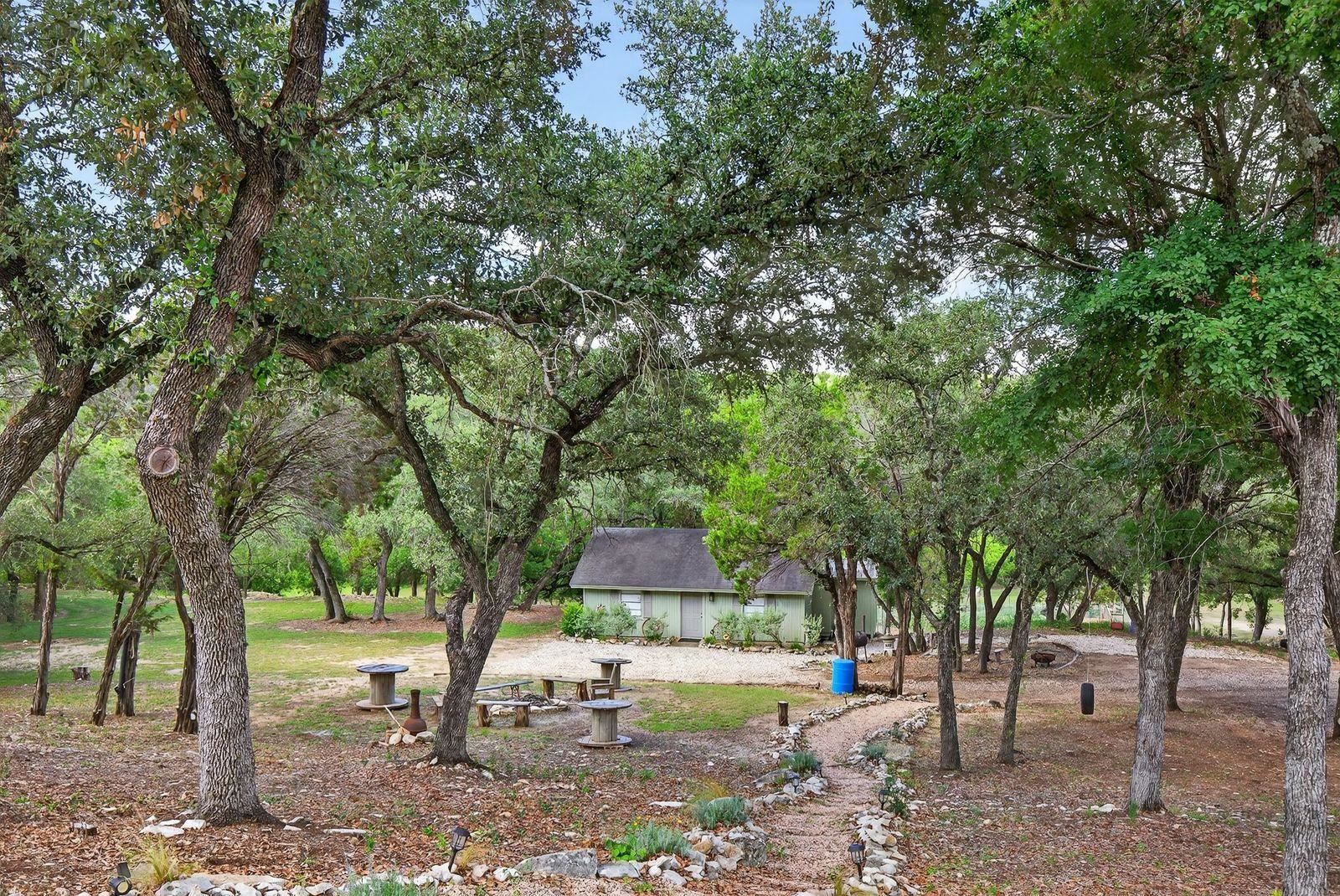 23644 Nameless Road Leander, TX 78641 - Photo 14 of 29 a front view of a house with a tree