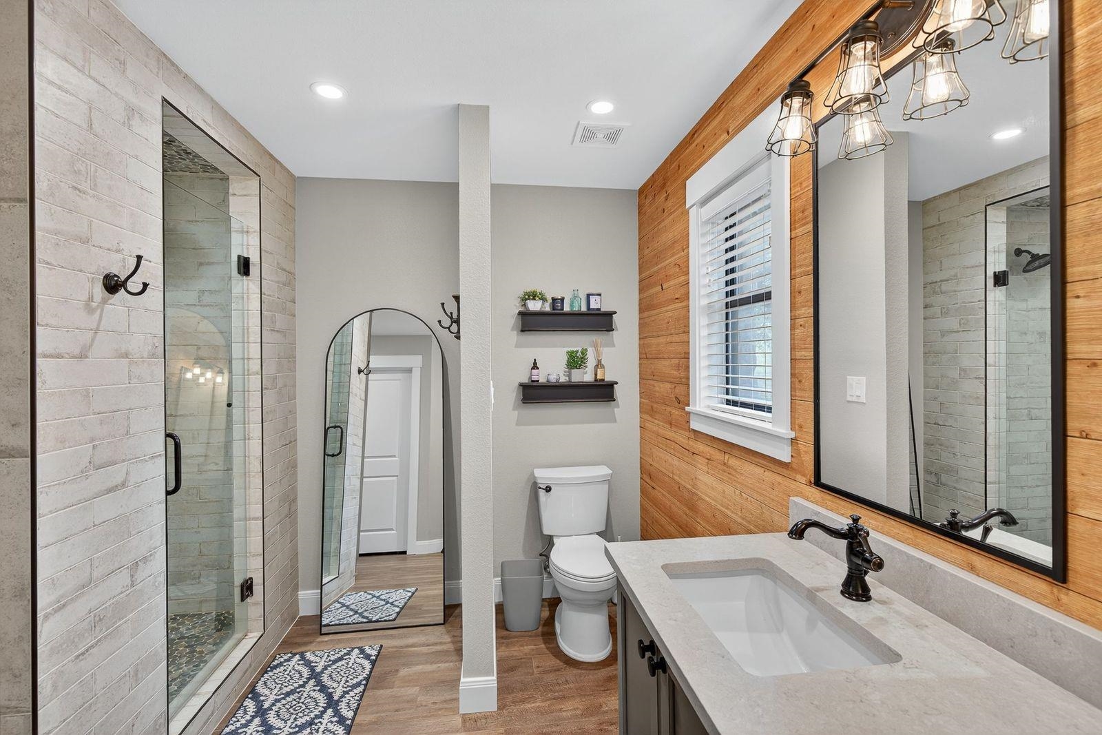23644 Nameless Road Leander, TX 78641 - Photo 10 of 29 a bathroom with a sink and a mirror