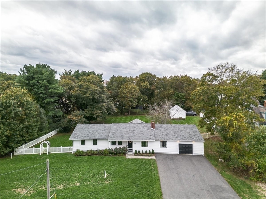 1057 Whitman Street Hanson, MA 02341 - Photo 33 of 40 a view of a house with garden
