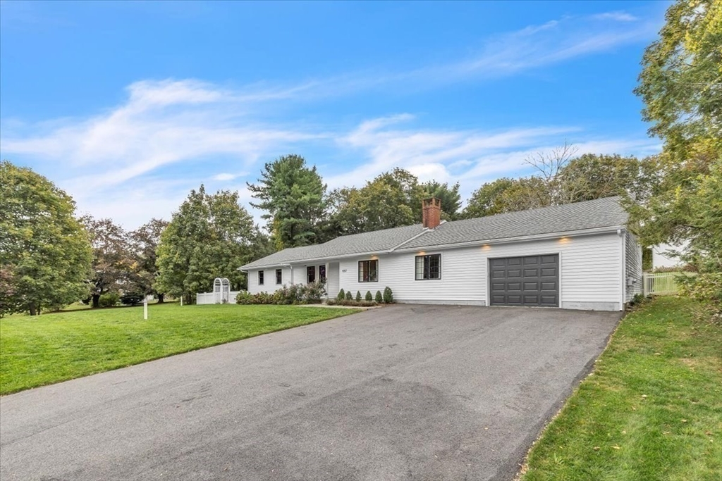 1057 Whitman Street Hanson, MA 02341 - Photo 35 of 40 a view of house with outdoor space and yard