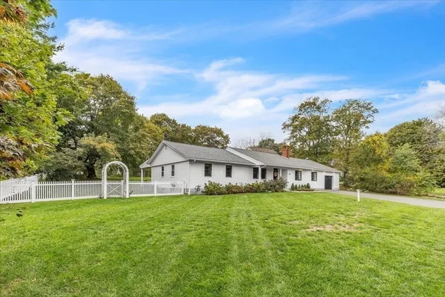 a house view with a garden space