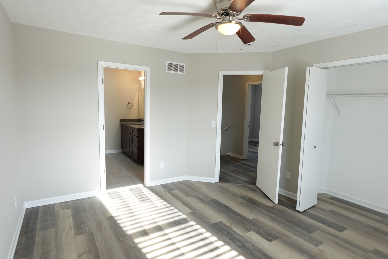 2140 Maxine Lane Rockford, IL 61102 - Photo 12 of 23 a view of a hallway view with wooden floor and staircase