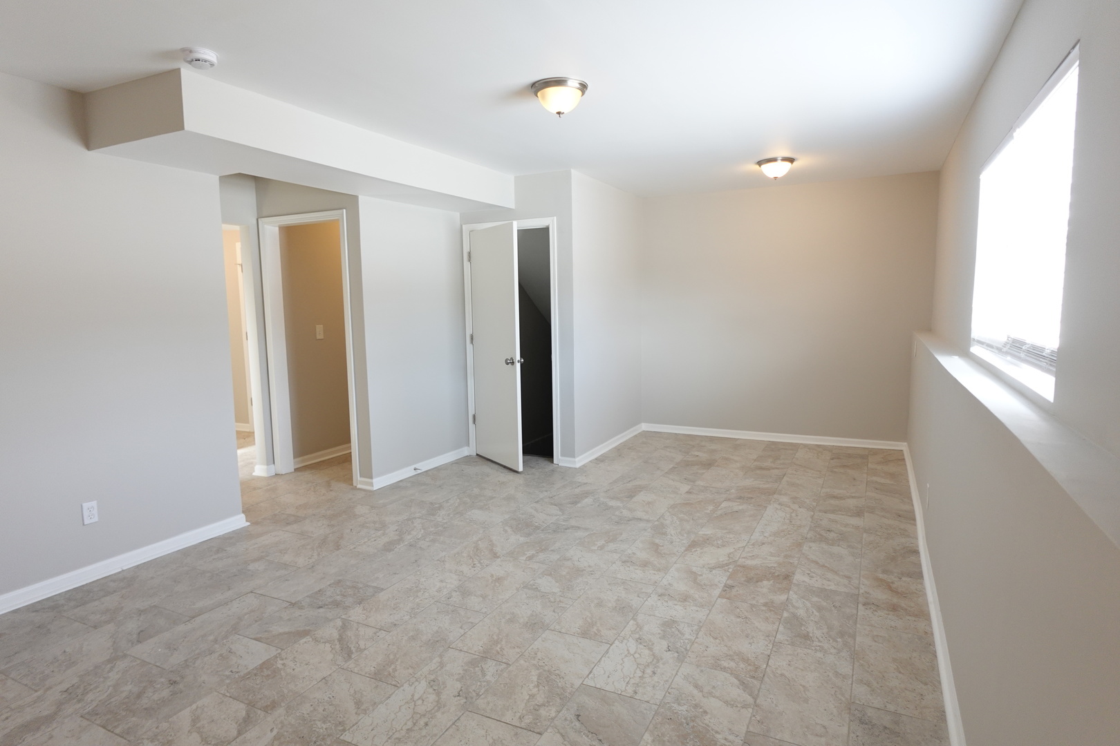 2140 Maxine Lane Rockford, IL 61102 - Photo 18 of 23 a view of an empty room with a window