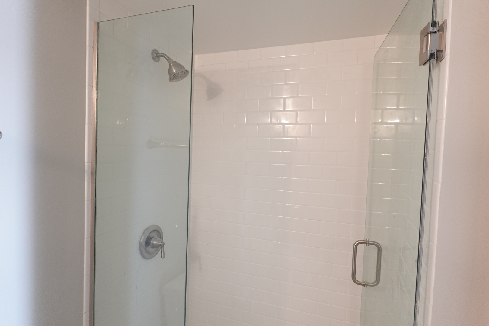 2140 Maxine Lane Rockford, IL 61102 - Photo 21 of 23 a bathroom with a glass shower door