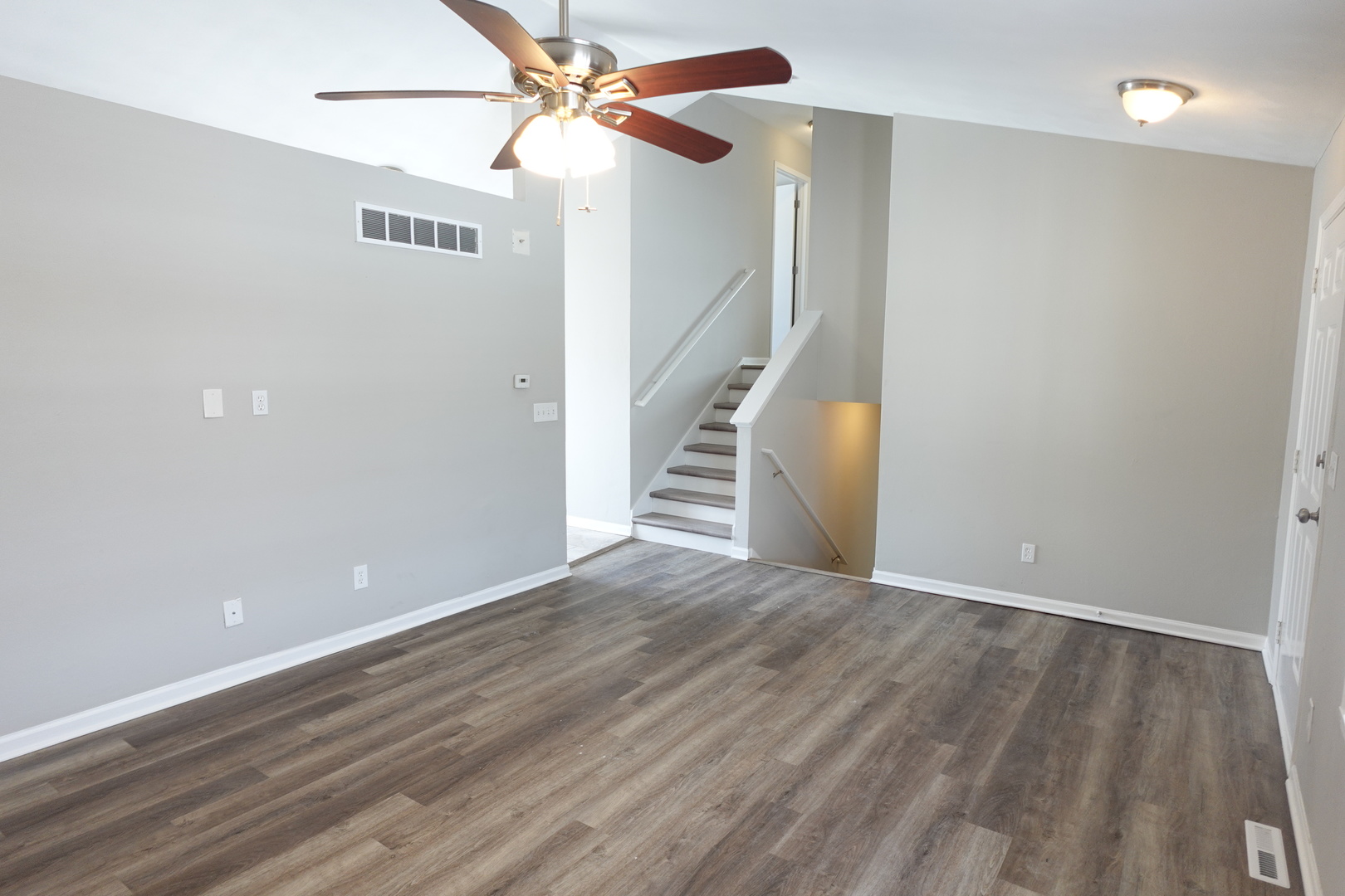 2140 Maxine Lane Rockford, IL 61102 - Photo 5 of 23 wooden floor in an empty room with a window
