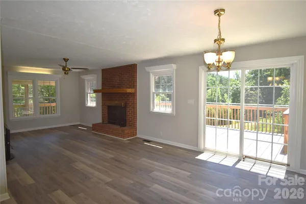 a bathroom with a sink vanity mirror and toilet