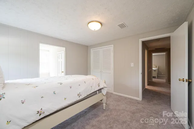 a view of a door and wooden floor