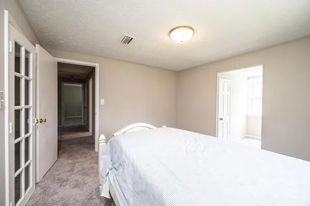 a room with lots of wooden furniture