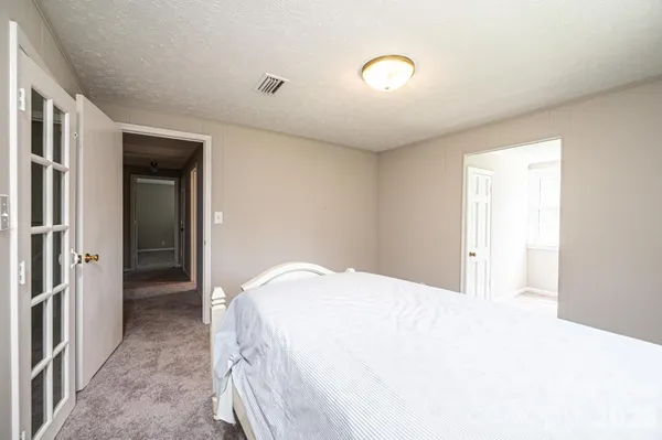 a room with lots of wooden furniture