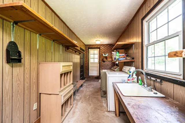 a view of a yard with swimming pool