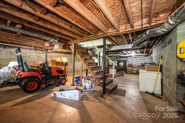 a view of a lush green hillside and a houses