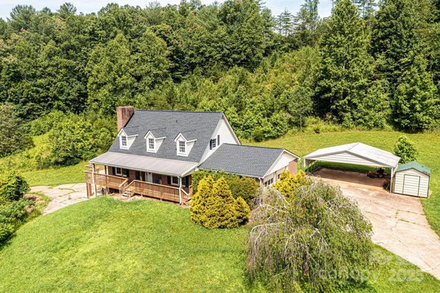 an aerial view of a house with garden space