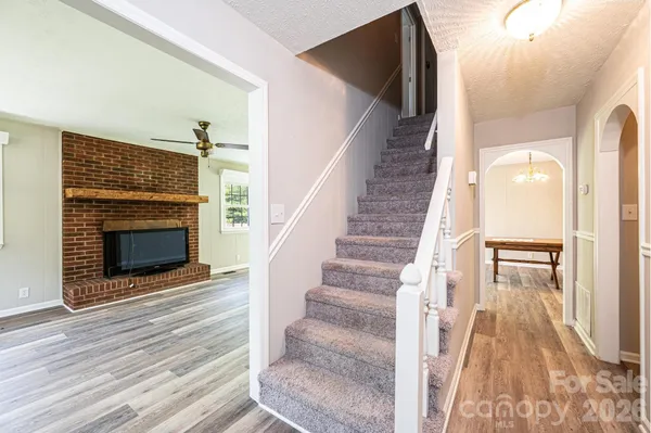 a kitchen with a table and chairs in it