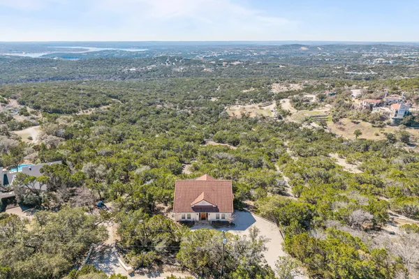 an aerial view of residential house with parking space
