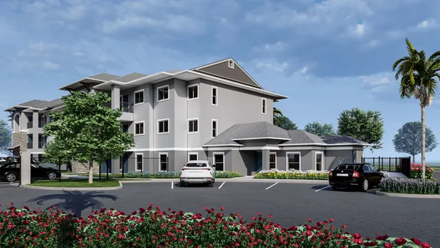 a view of a house with a garden and pathway