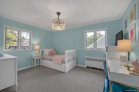 a view of a livingroom with furniture and windows