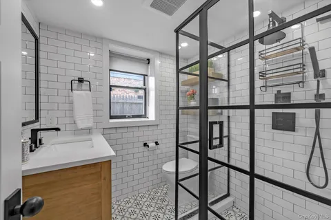 a bathroom with a sink and a shower
