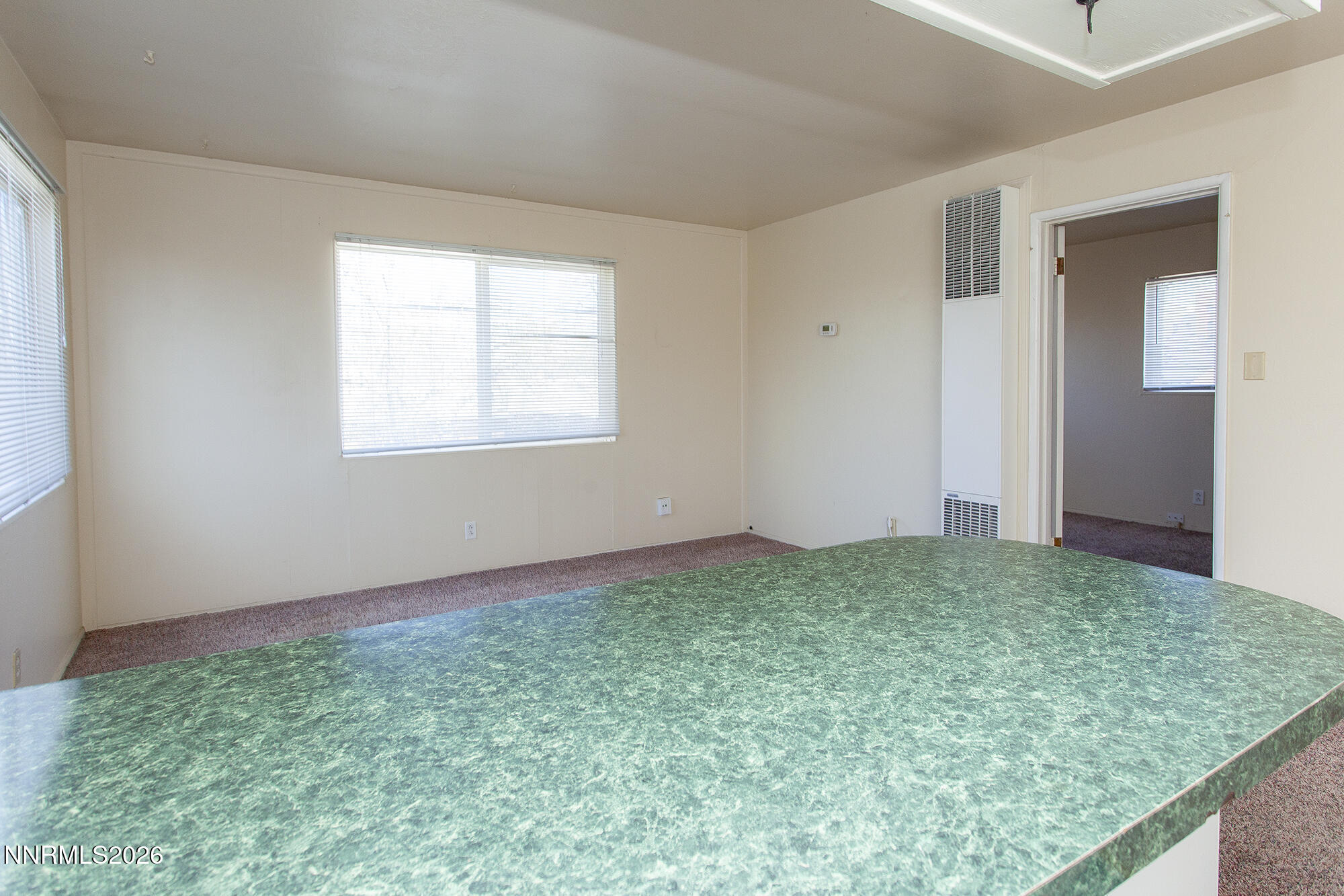1060 Wilson Avenue Reno, NV 89502 - Photo 11 of 17 a view of an empty room and window